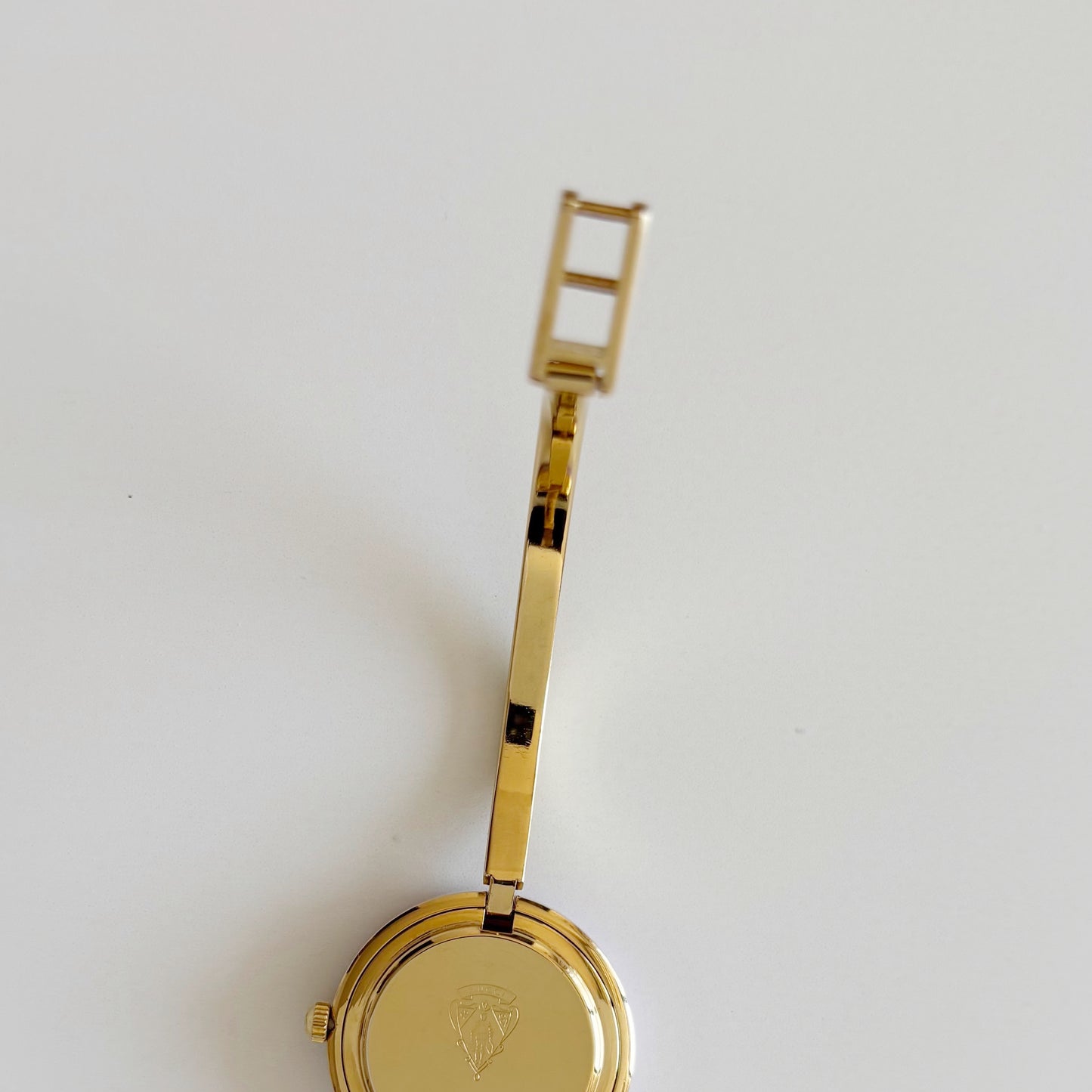 Gucci 1990s Interchangeable Bezel Gold Plated Bangle Watch with 12 bezels, case