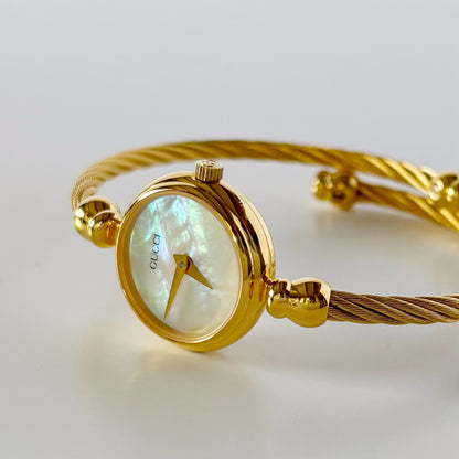 Gucci 1990s Seashell Dial Gold Plated Cable Band Bangle Watch