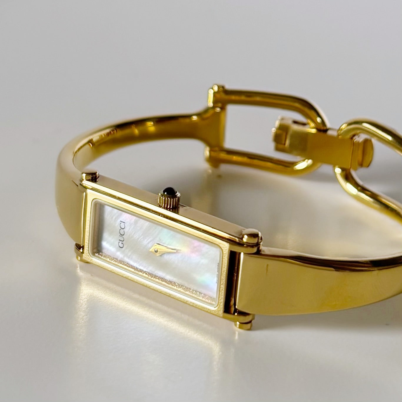 Gucci 1990s Seashell Rectangular Dial Gold Plated Bangle Watch