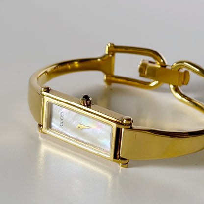 Gucci 1990s Seashell Rectangular Dial Gold Plated Bangle Watch