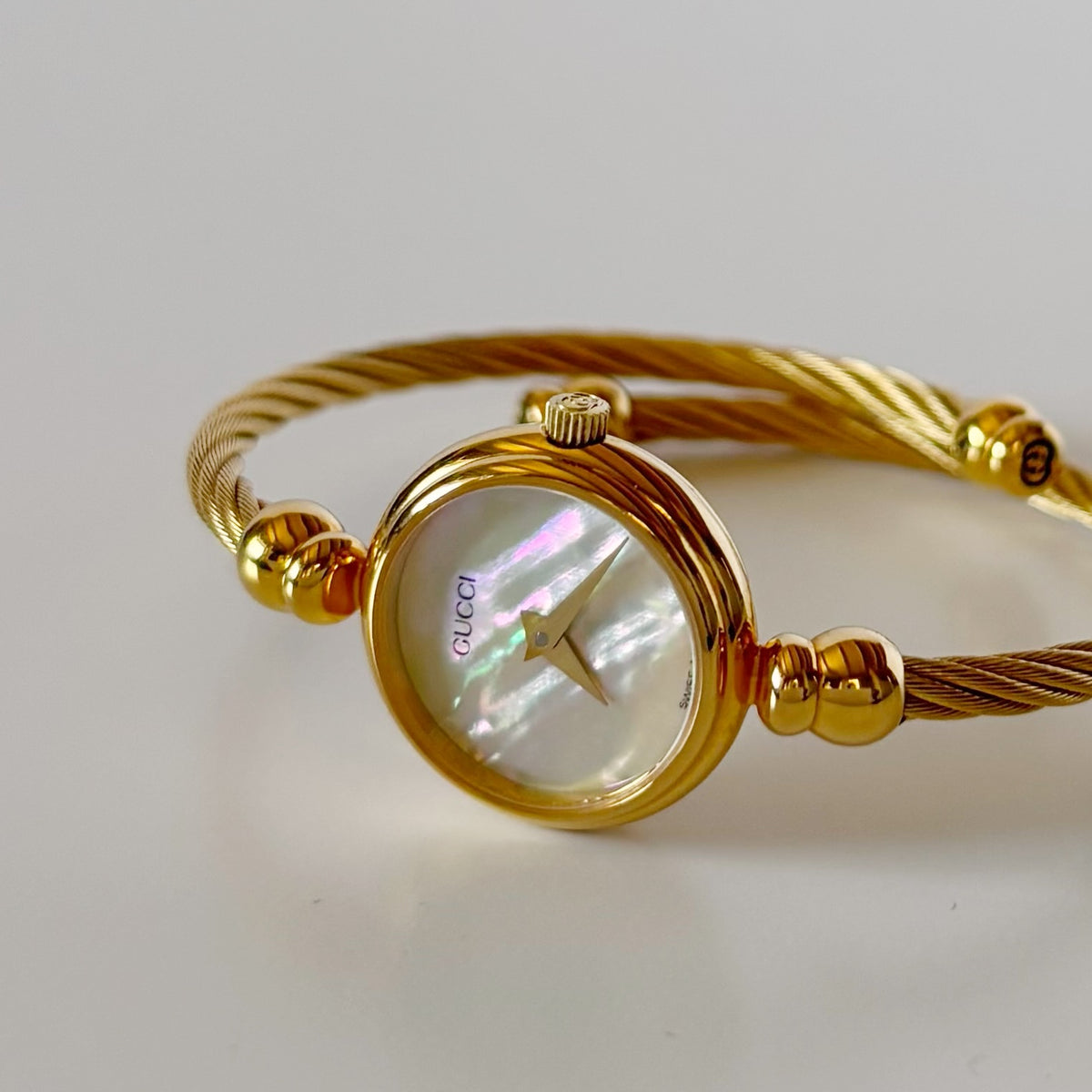 Gucci 1990s Seashell Dial Gold Plated Cable Bangle Watch
