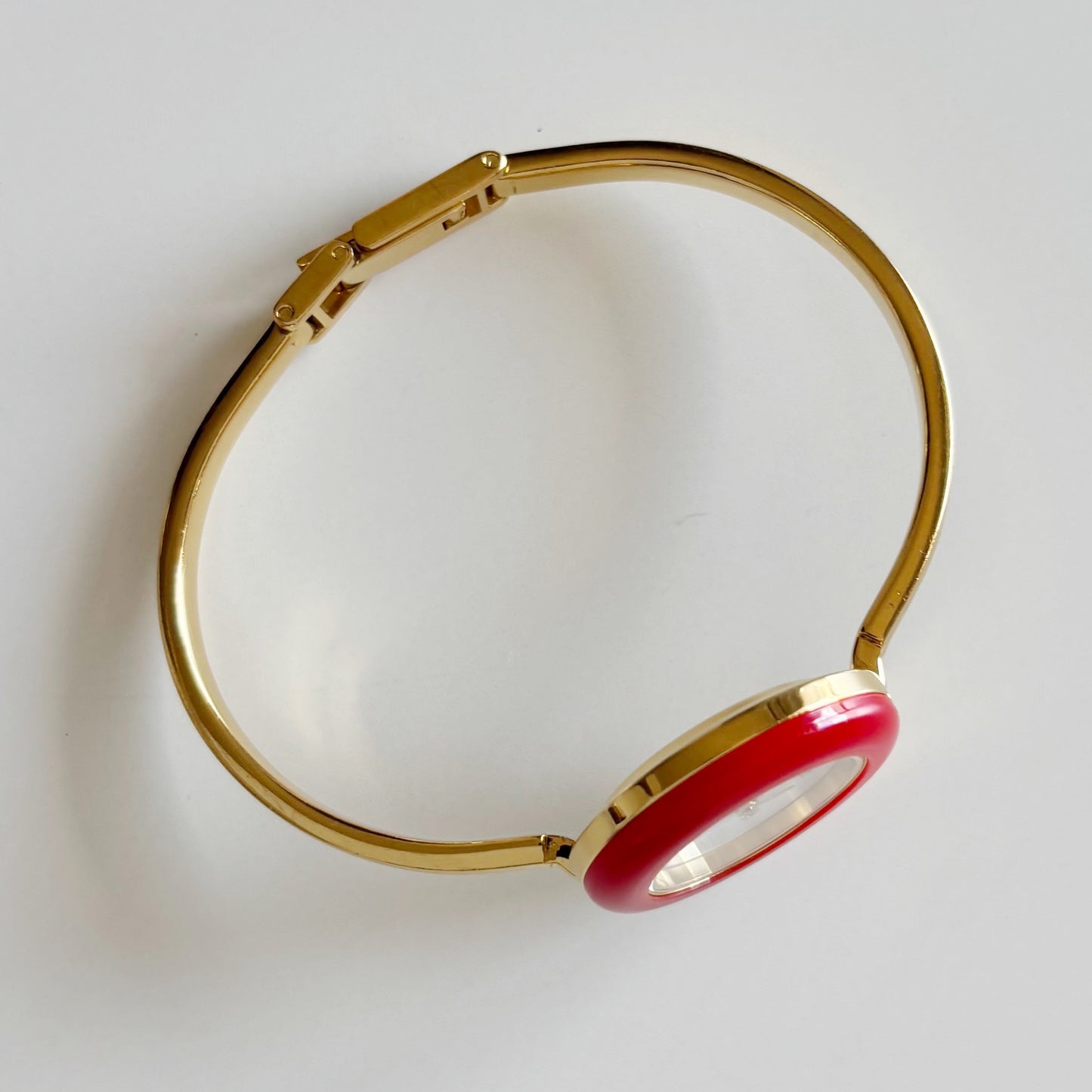 Gucci 1990s Interchangeable Bezel Gold Plated Bangle Watch with 12 bezels, case