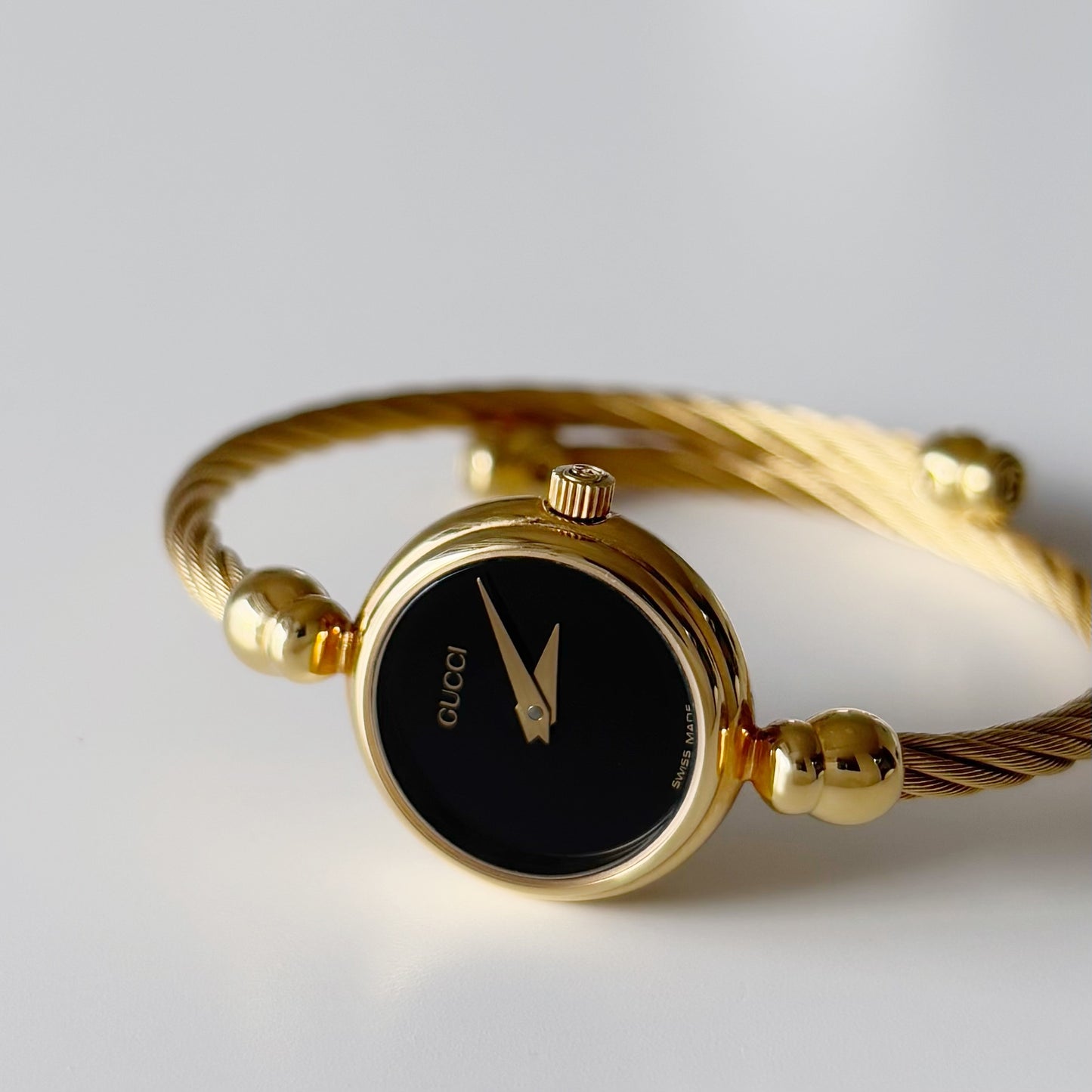 Gucci 1990s Black Dial Gold Plated Bangle Watch