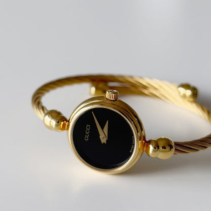 Gucci 1990s Black Dial Gold Plated Bangle Watch