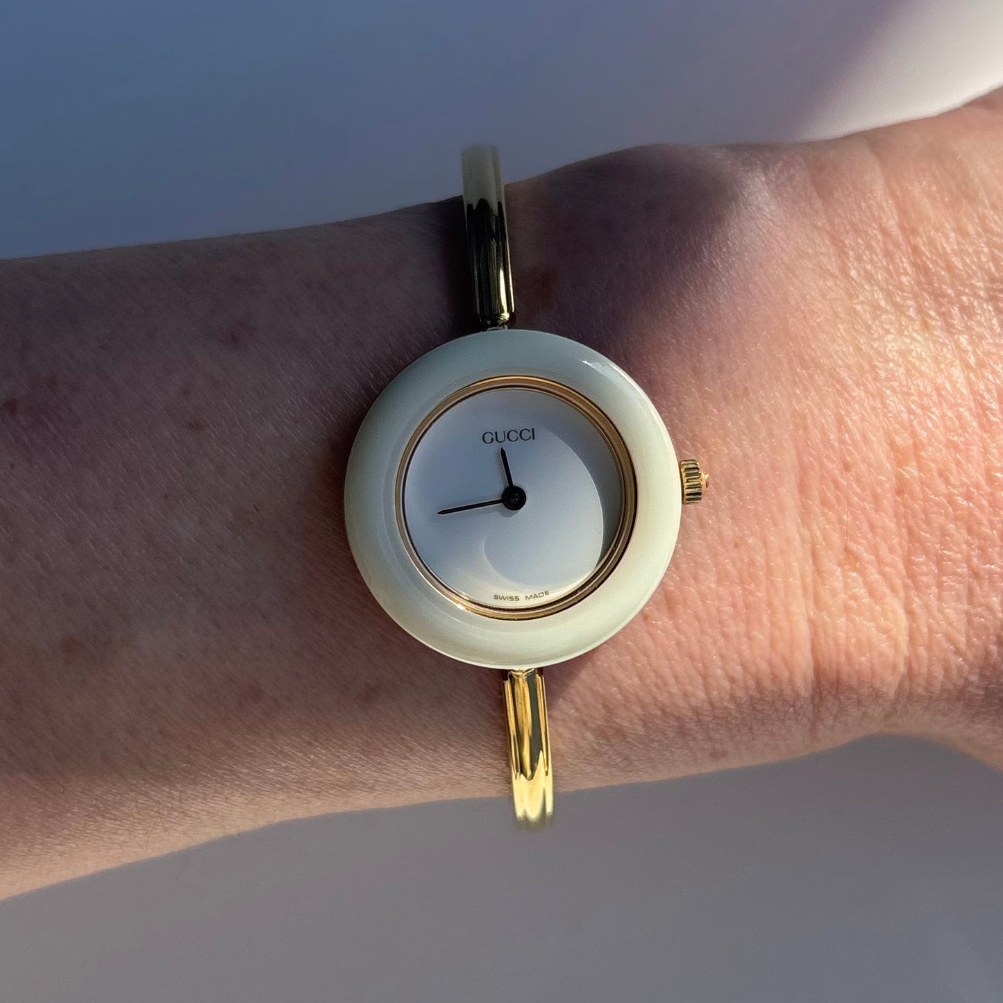 Gucci 1990s Interchangeable Bezel Gold Plated Bangle Watch with 12 bezels, case
