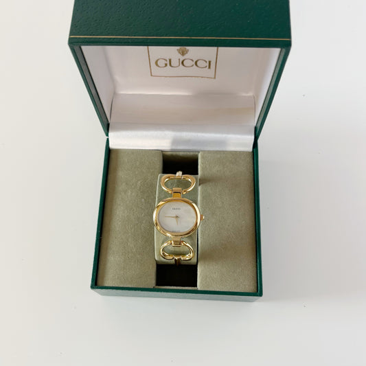 Gucci 1990s Seashell Oval Dial Gold Plated Bangle Watch (Small)