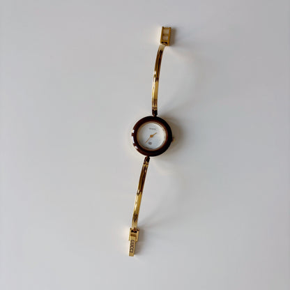 Gucci 1990s Interchangeable Bezel Gold Plated Bangle Watch with 12 bezels, case