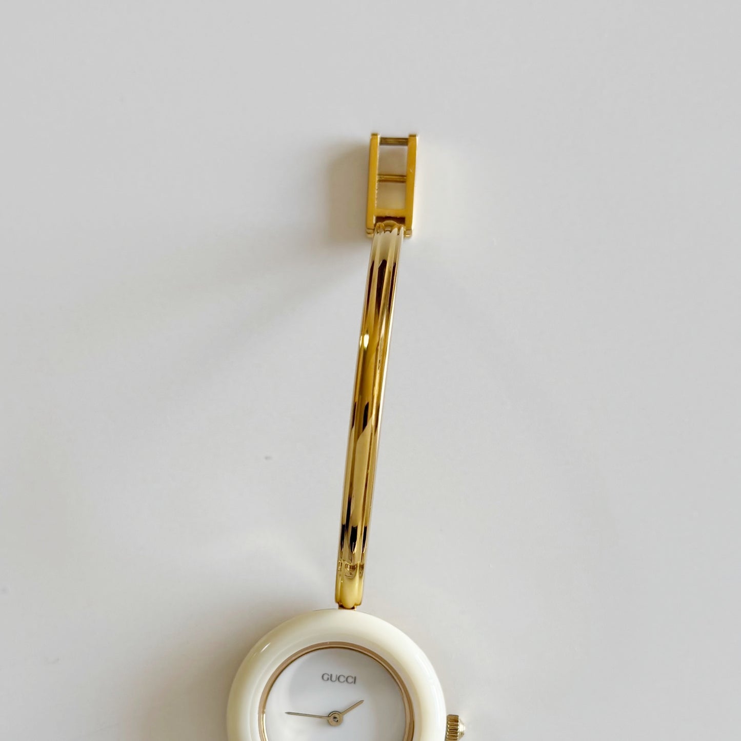 Gucci 1990s Interchangeable Bezel Gold Plated Bangle Watch with 12 bezels, case