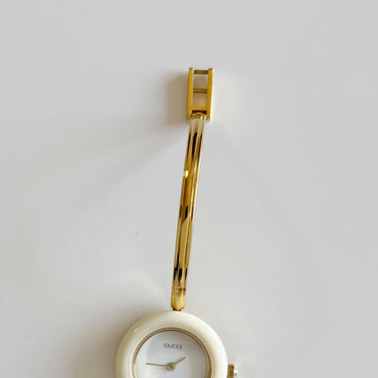 Gucci 1990s Interchangeable Bezel Gold Plated Bangle Watch with 12 bezels, case