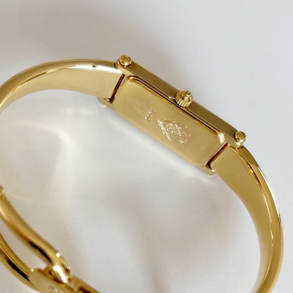 Gucci 1990s Gold Dial Rectangular Gold Plated Bangle Watch