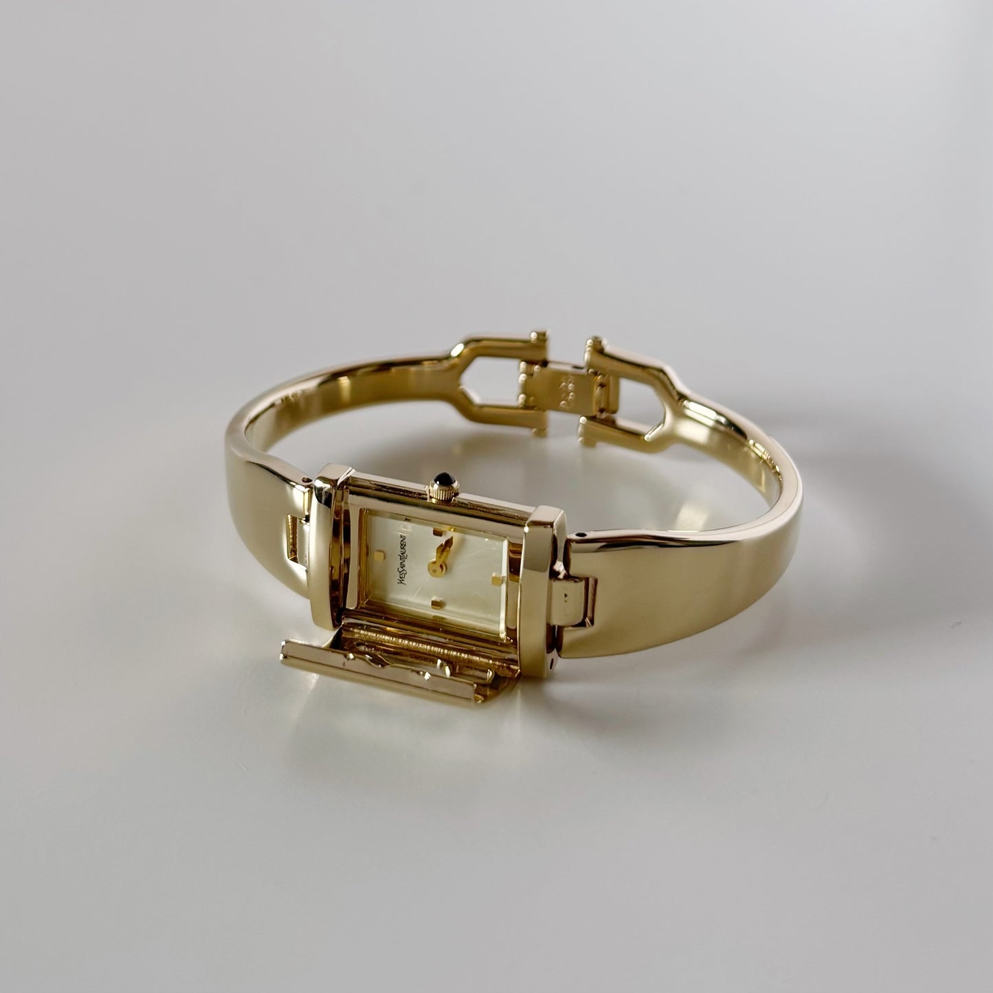Yves Saint Laurent 1990s Peek-A-Boo Gold Plated Bangle Watch