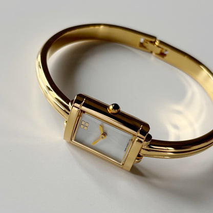 Yves Saint Laurent 1990s Seashell Dial Gold Plated Bangle Watch