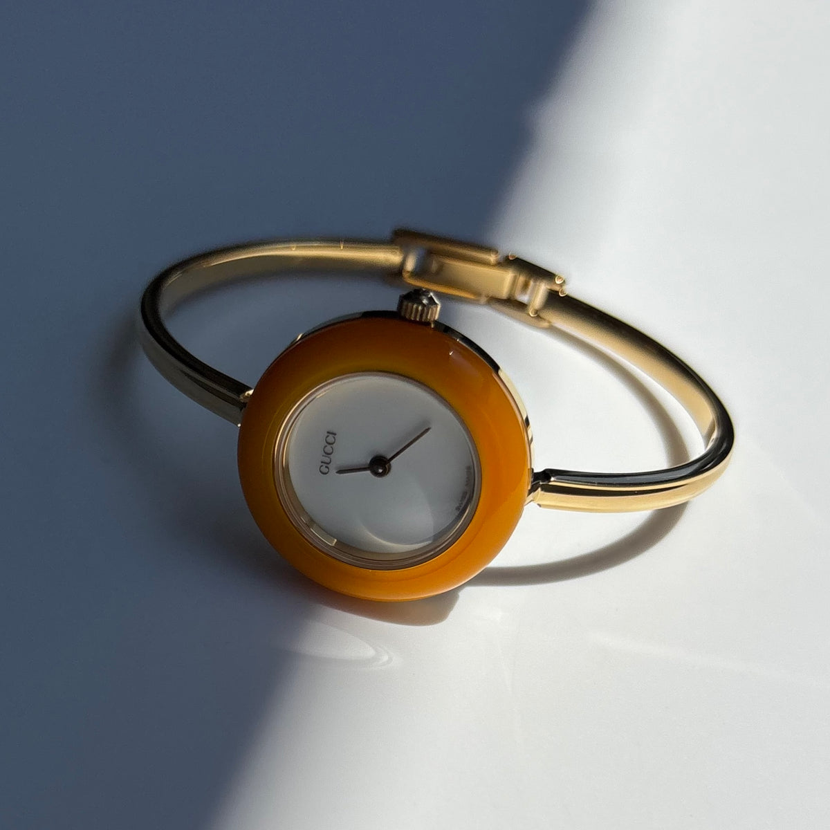 Gucci 1990s Interchangeable Bezel Gold Plated Bangle Watch with 12 bezels, case