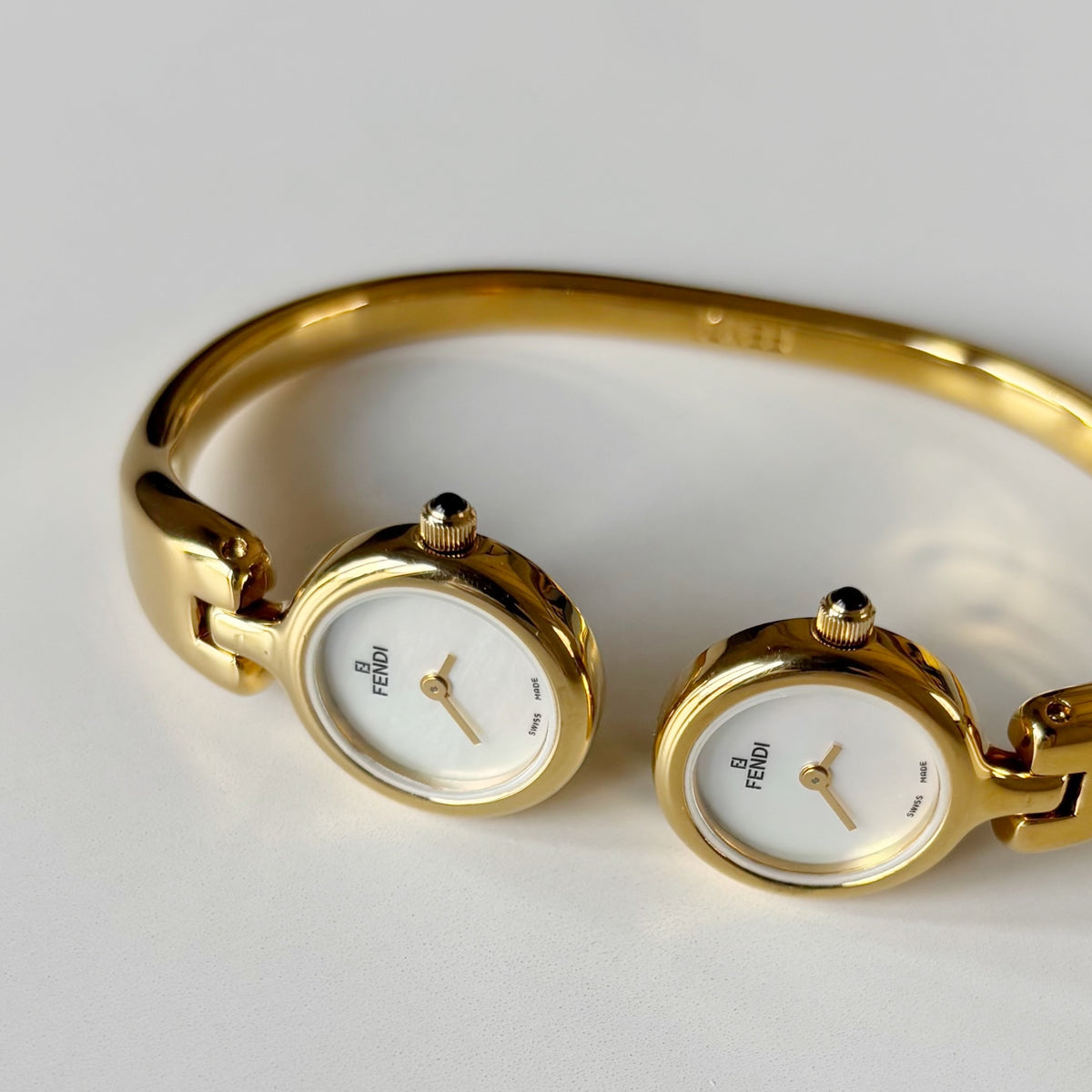 Fendi 1990s Seashell Dial Two Time Zone Gold Plated Bangle Watch
