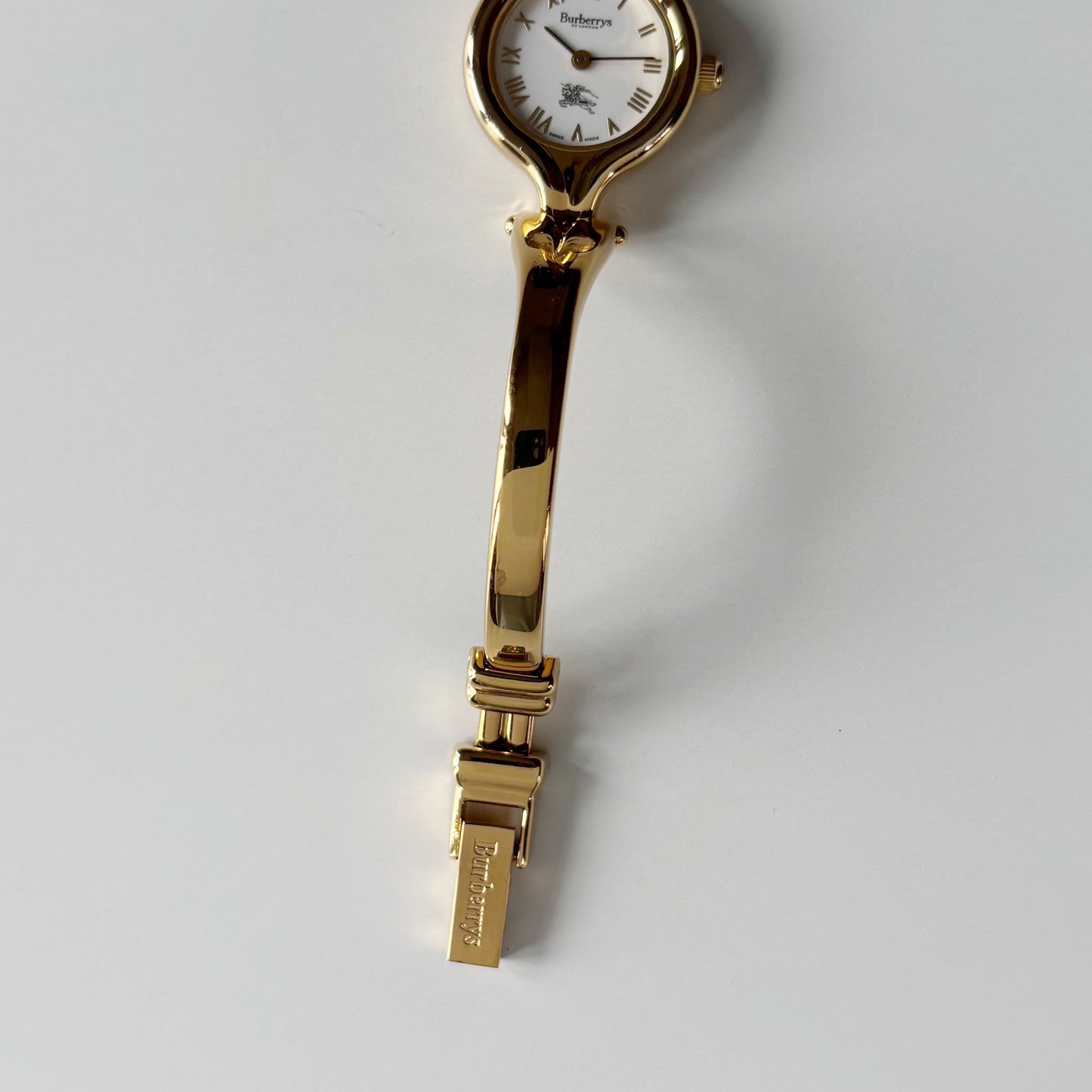 Burberry 1990s Round Dial Gold Plated Bangle Watch