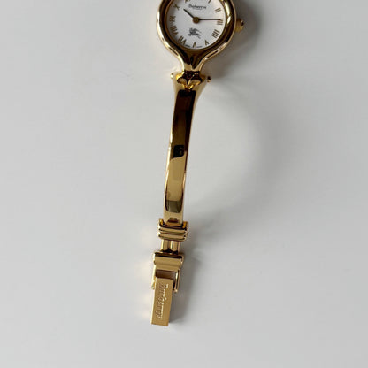 Burberry 1990s Round Dial Gold Plated Bangle Watch