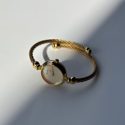 Gucci 1990s Seashell Dial Gold Plated Cable Bangle Watch