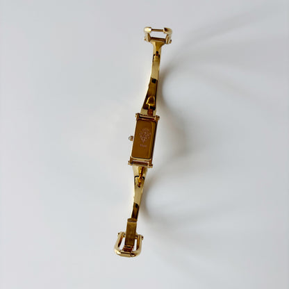 Gucci 1990s Black Dial Gold Plated Bangle Watch