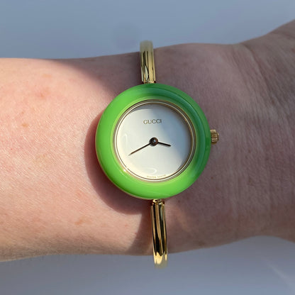 Gucci 1990s Interchangeable Bezel Gold Plated Bangle Watch with 12 bezels, case (Small)