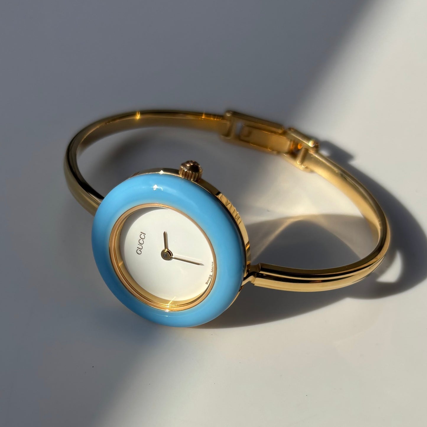 Gucci 1990s Interchangeable Bezel Gold Plated Bangle Watch with 12 bezels, case