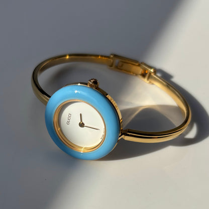 Gucci 1990s Interchangeable Bezel Gold Plated Bangle Watch with 12 bezels, case