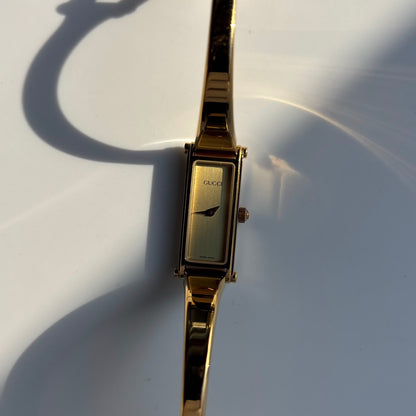 Gucci 1990s Gold Dial Rectangular Gold Plated Bangle Watch