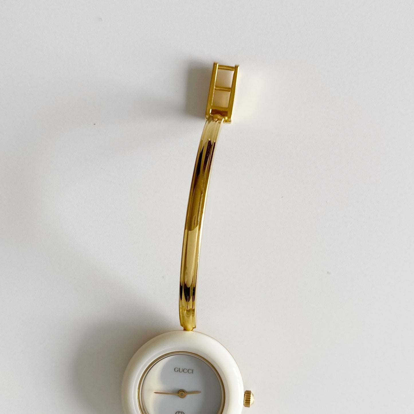 Gucci 1990s Interchangeable Bezel Gold Plated Bangle Watch with 12 bezels, case