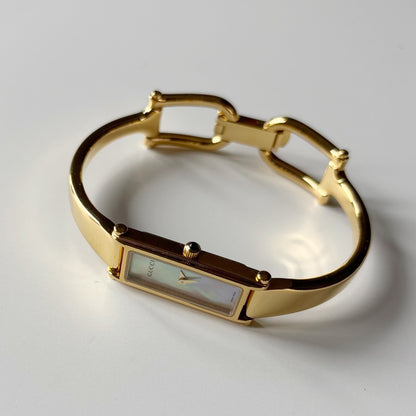 Gucci 1990s Seashell Rectangular Dial Gold Plated Bangle Watch
