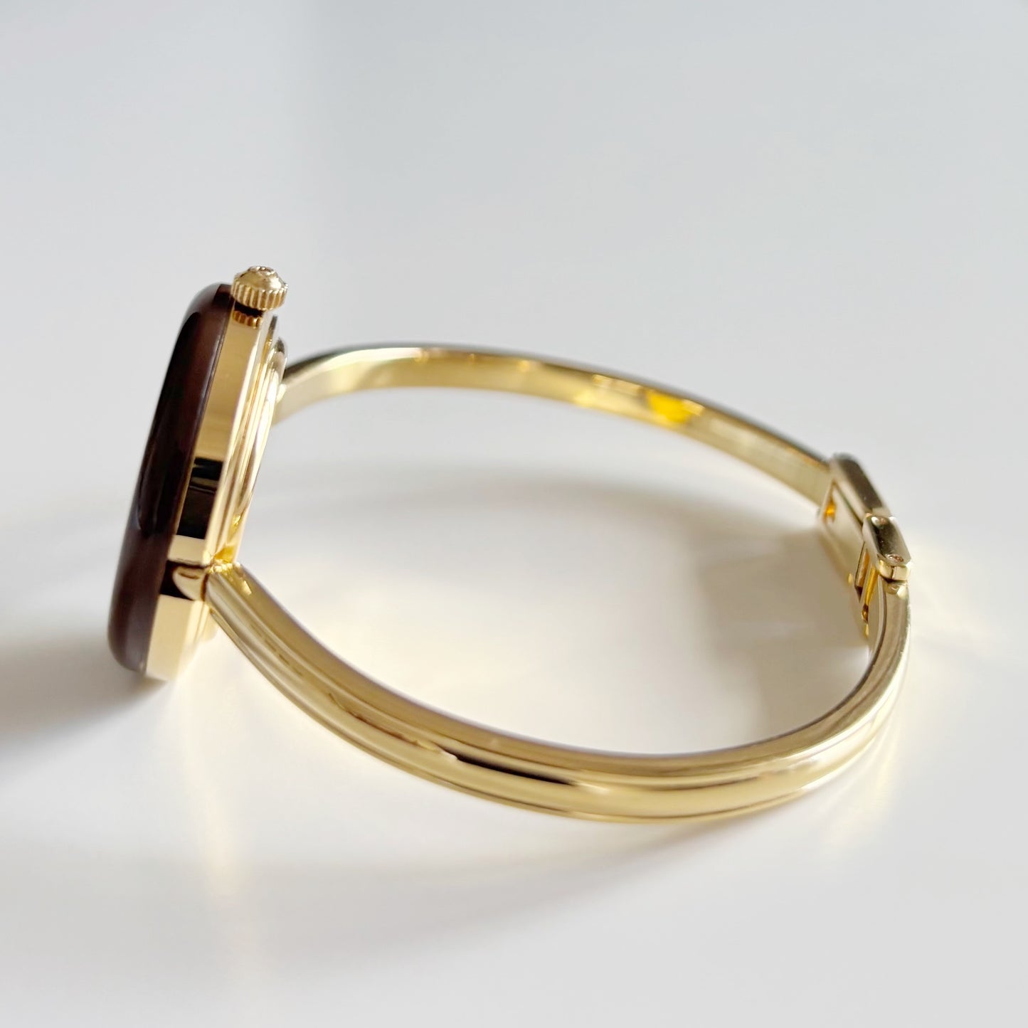 Gucci 1990s Interchangeable Bezel Gold Plated Bangle Watch with 12 bezels, case