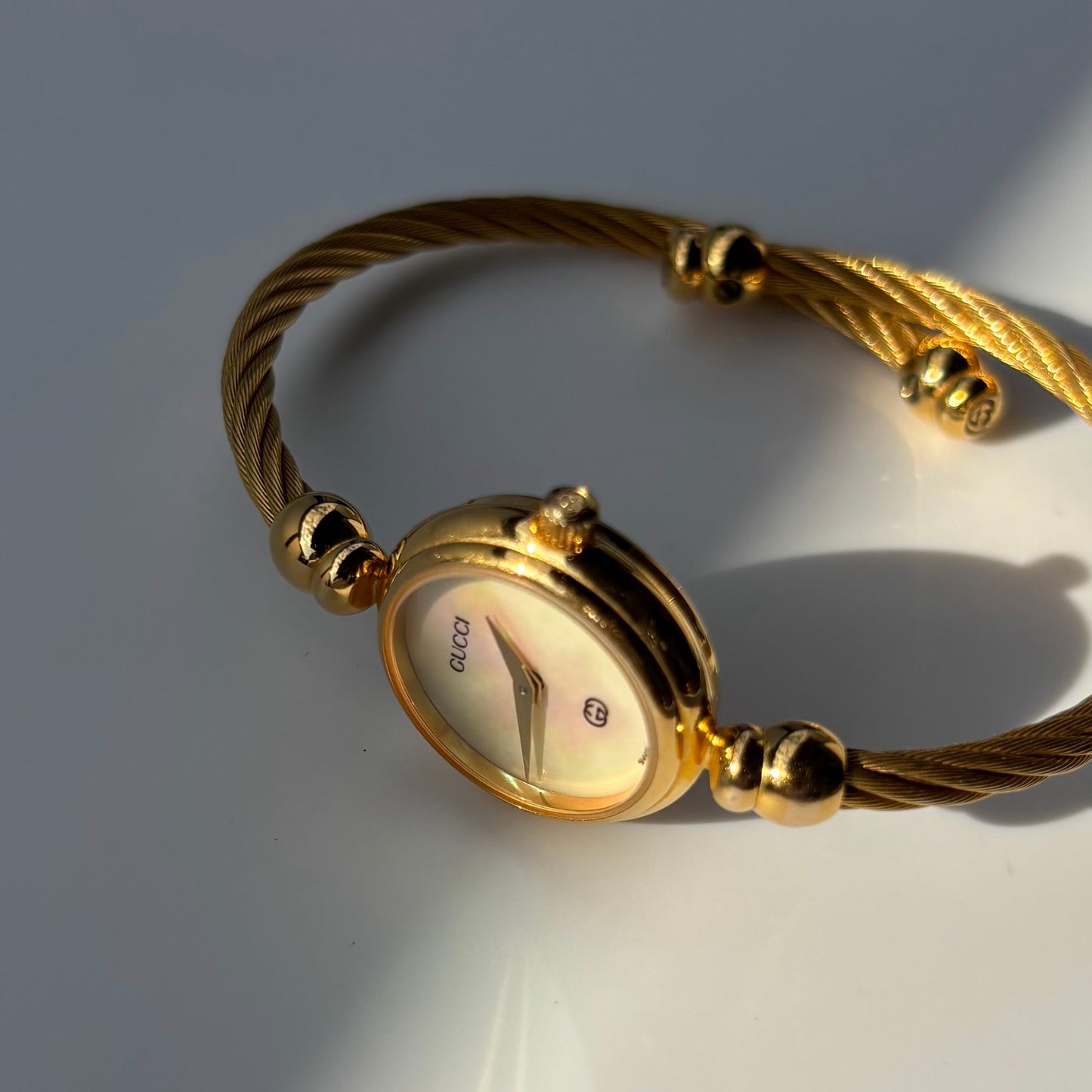 Gucci 1990s Seashell Dial Cable Gold Plated Bangle Watch