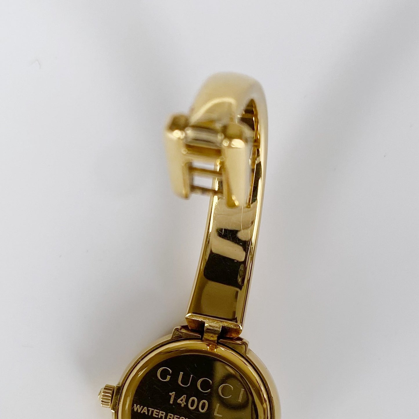 Gucci 1990s Gold Plated Round Bangle Watch