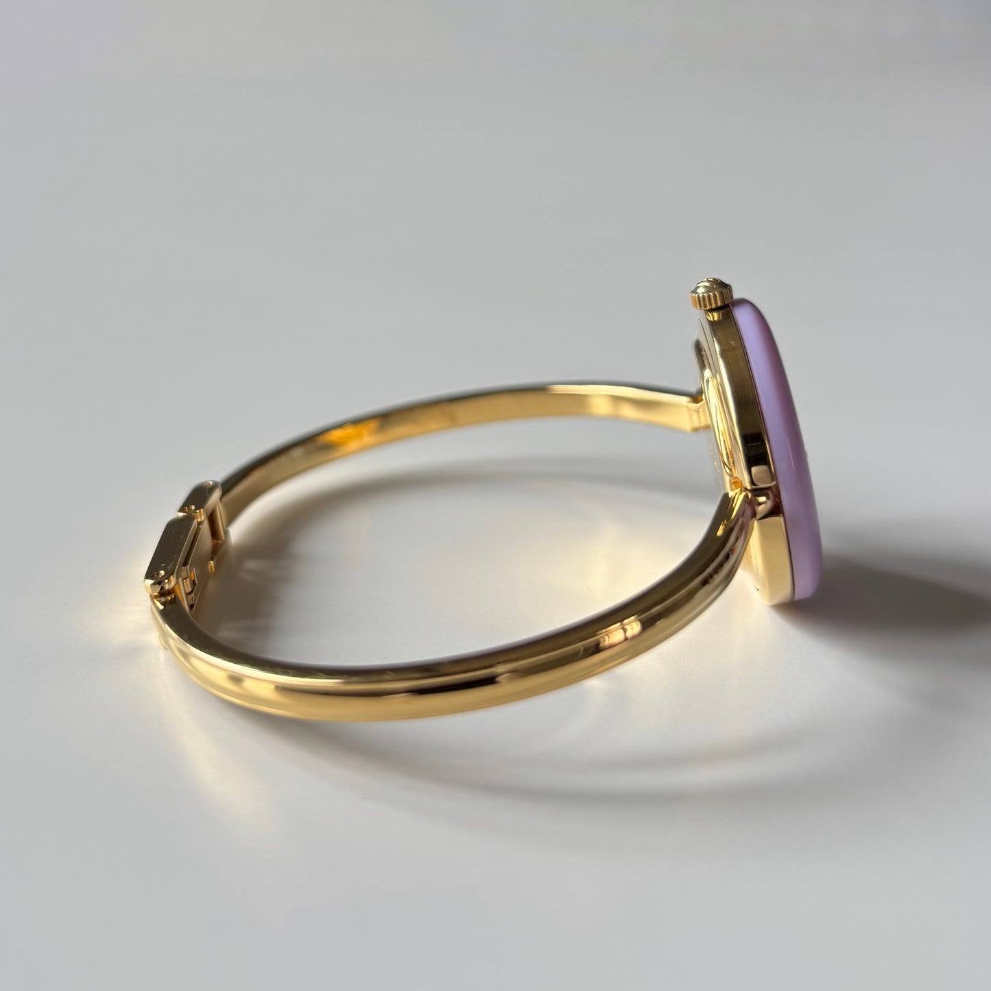 Gucci 1990s Interchangeable Bezel Gold Plated Bangle Watch with 12 bezels, case