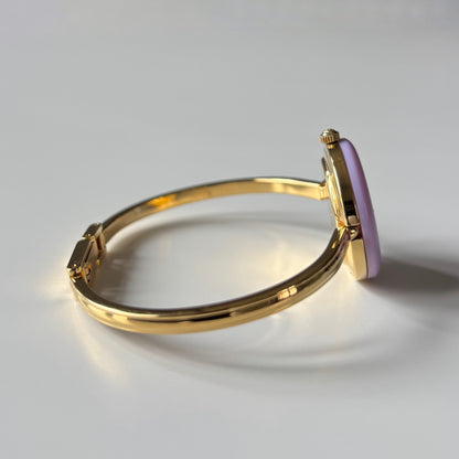 Gucci 1990s Interchangeable Bezel Gold Plated Bangle Watch with 12 bezels, case