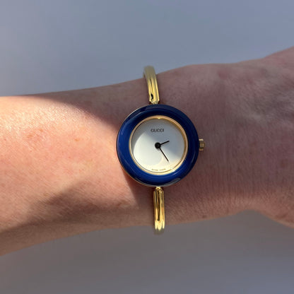 Gucci 1990s Interchangeable Bezel Gold Plated Bangle Watch with 12 bezels, case