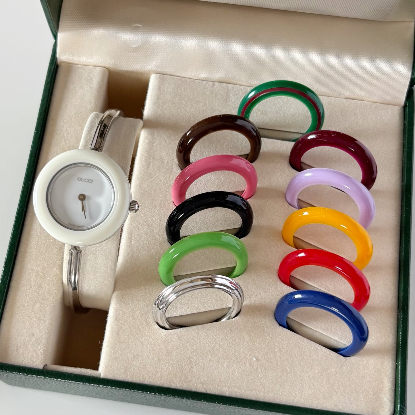 Gucci 1990s Interchangeable Bezel Stainless steel Bangle Watch with case, 12 bezels