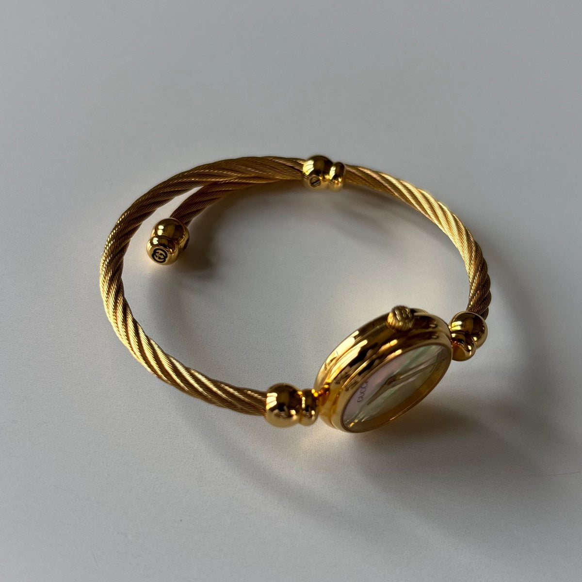 Gucci 1990s Seashell Dial Gold Plated Cable Bangle Watch