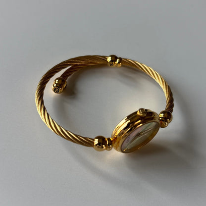 Gucci 1990s Seashell Dial Gold Plated Cable Bangle Watch