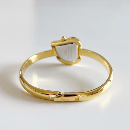 Yves Saint Laurent 1990s Heart Shaped Dial Gold Plated Bangle Watch