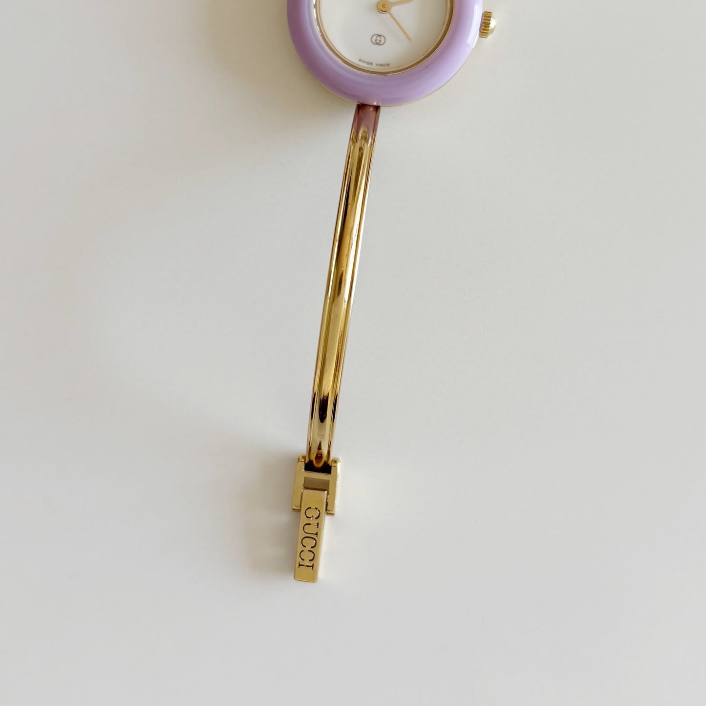 Gucci 1990s Interchangeable Bezel Gold Plated Bangle Watch with 12 bezels, case