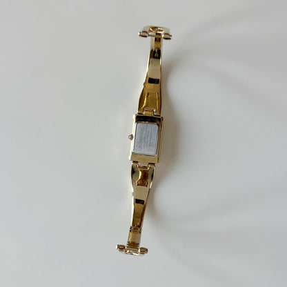 Yves Saint Laurent 1990s Peek a boo Gold Plated Bangle Watch