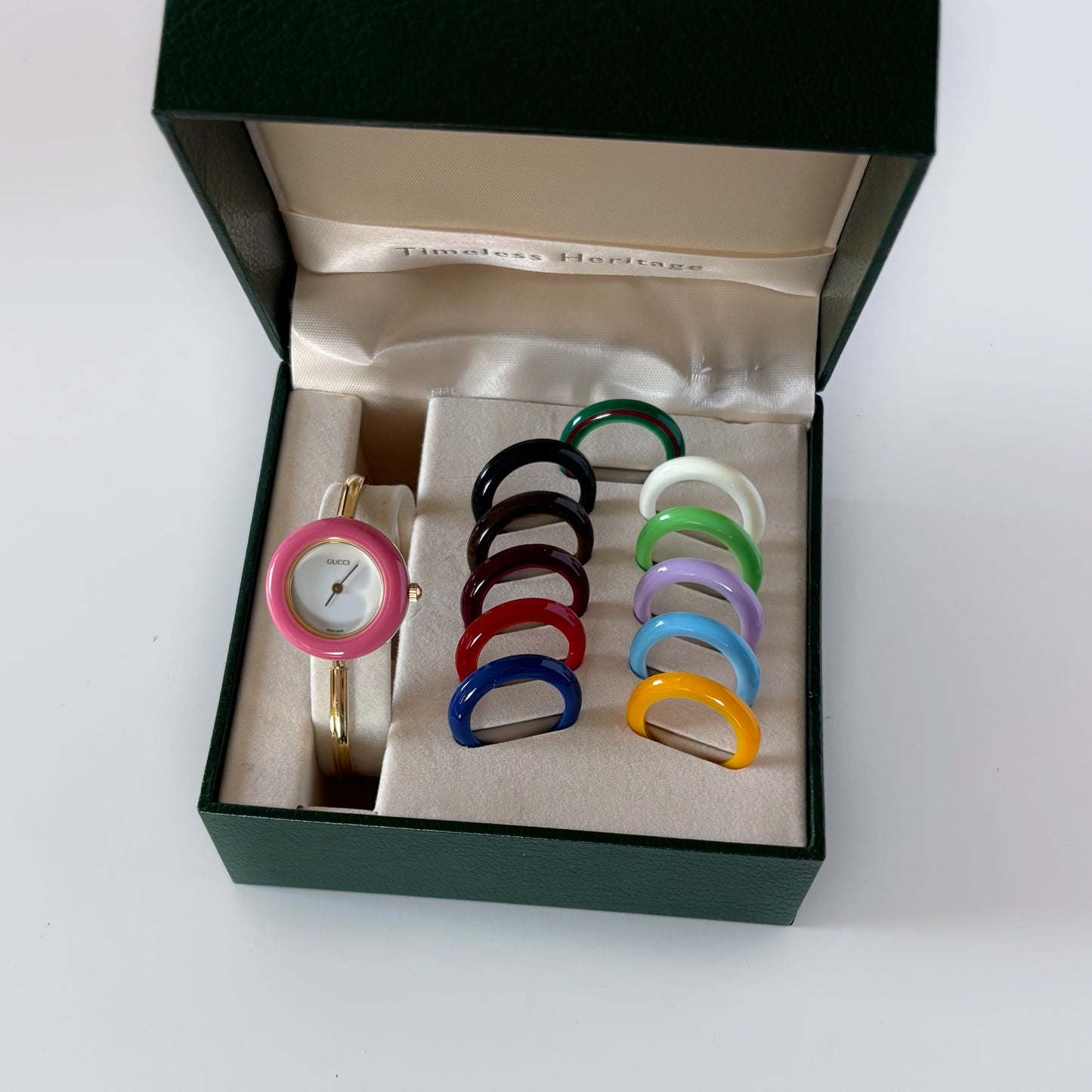 Gucci 1990s Interchangeable Bezel Gold Plated Bangle Watch with 12 bezels, case