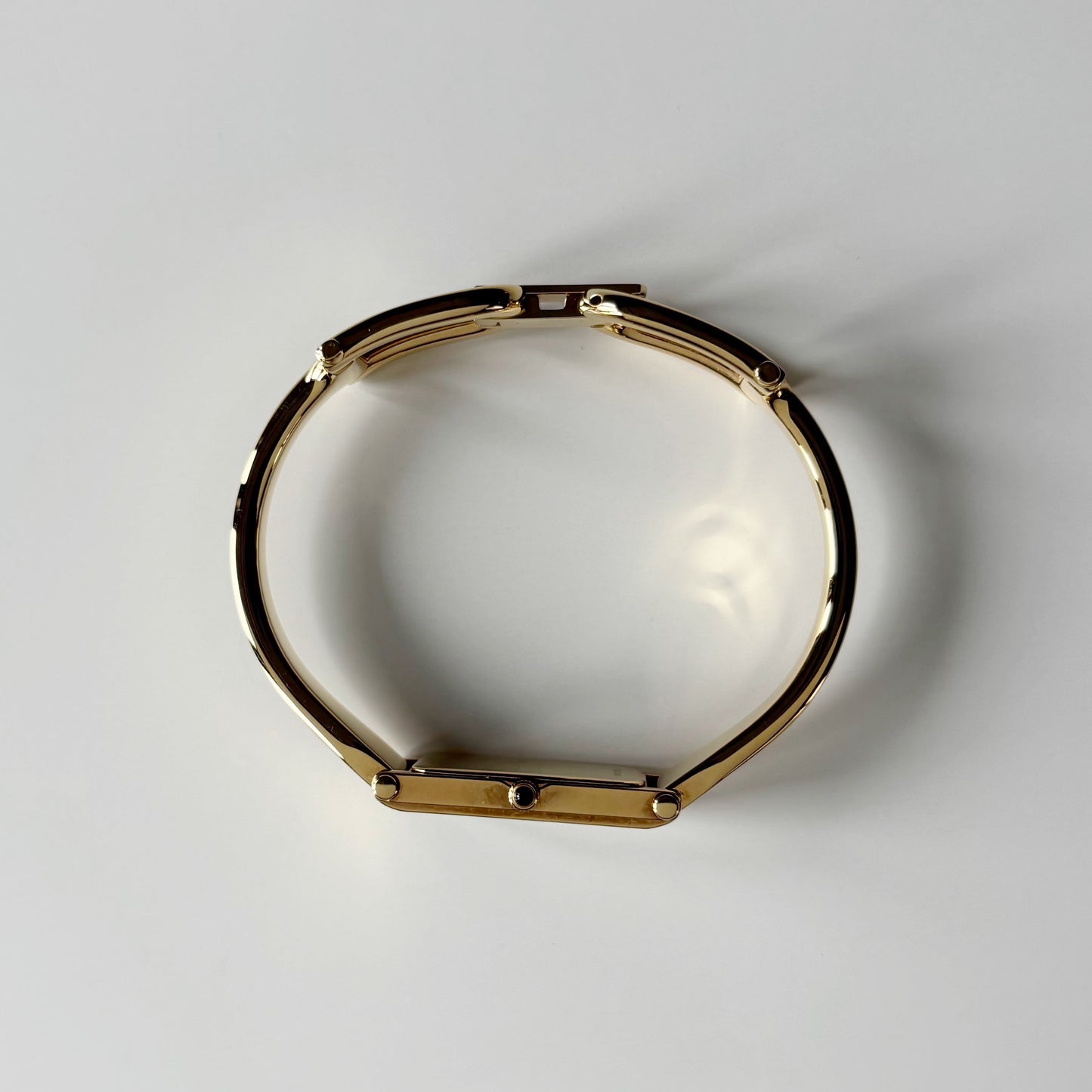 Gucci 1990s Gold Rectangular Dial Gold Plated Bangle Watch