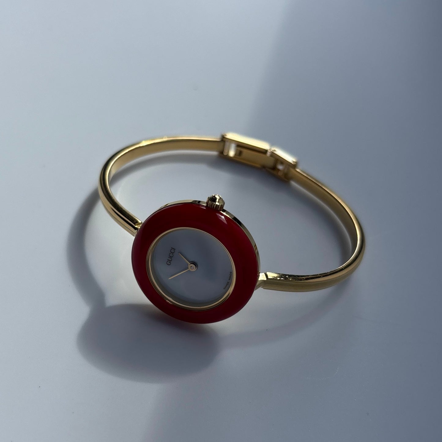 Gucci 1990s Interchangeable Bezel Gold Plated Bangle Watch with 12 bezels, case