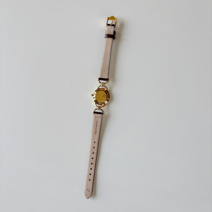 Gucci 1990s Round Cream Dial Horsebit Gold Plated Watch