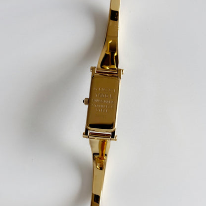 Gucci 1990s Seashell Dial Gold Plated Bangle Watch