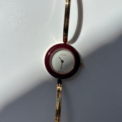 Gucci 1990s Interchangeable Bezel Gold Plated Bangle Watch with 12 bezels, case