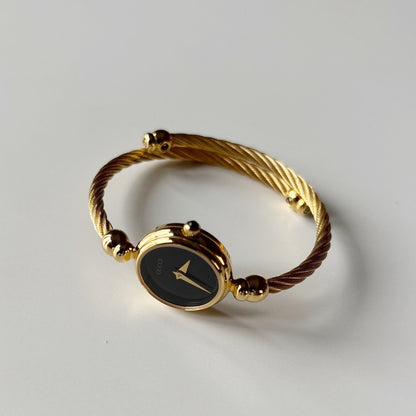 Gucci 1990s Black Dial Gold Plated Cable Bangle Watch