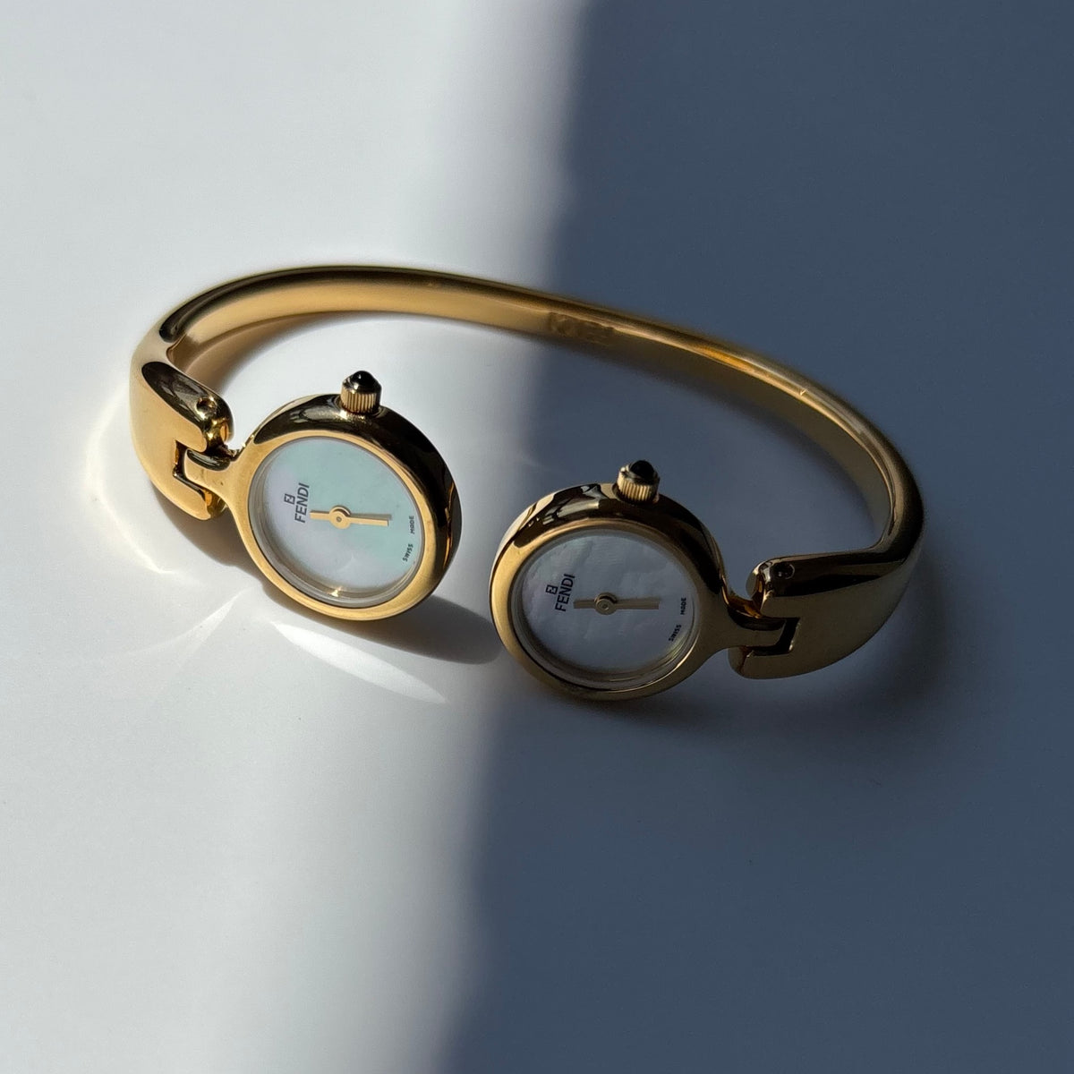 Fendi 1990s Seashell Dial Two Time Zone Gold Plated Bangle Watch