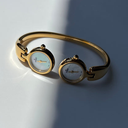 Fendi 1990s Seashell Dial Two Time Zone Gold Plated Bangle Watch