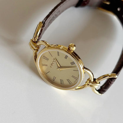 Gucci 1990s Gold Round Dial Horsebit Gold Plated Watch